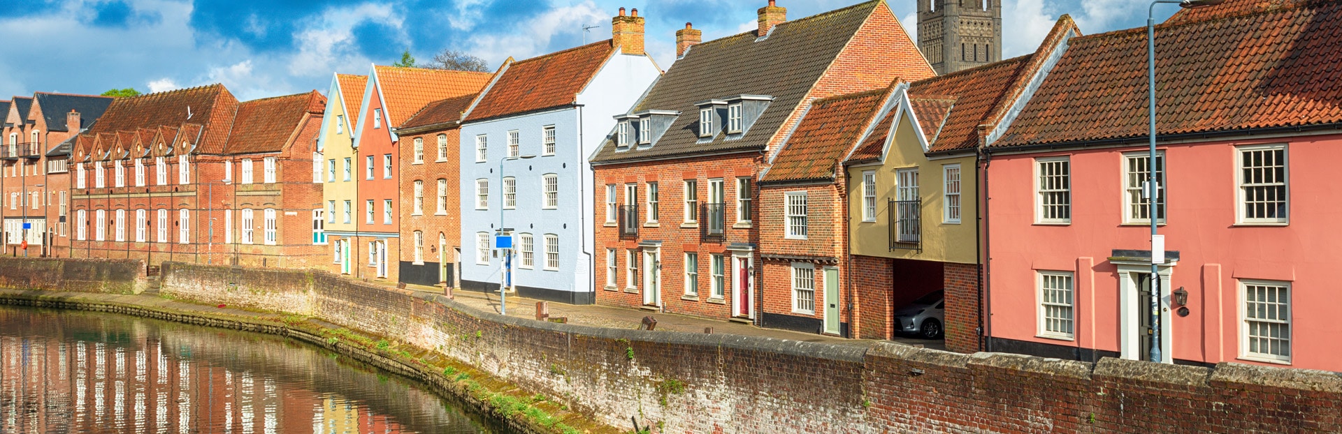 The quayside and historic warehouses along the river in Norwich