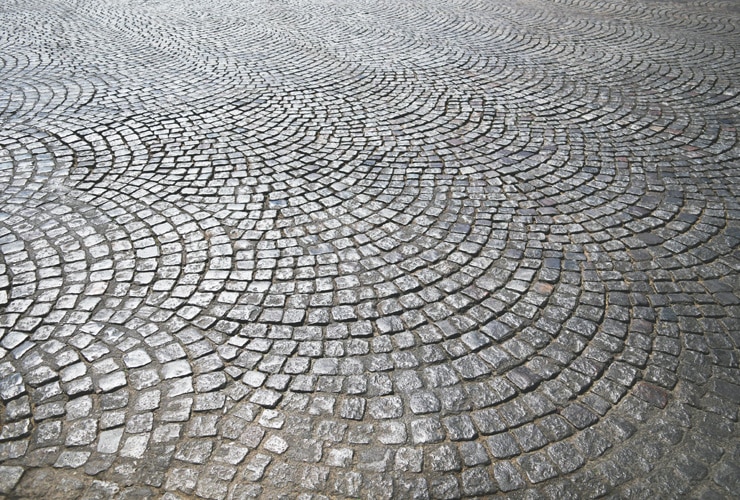 Cobbled Driveway A close up of a patterned cobbled driveway.