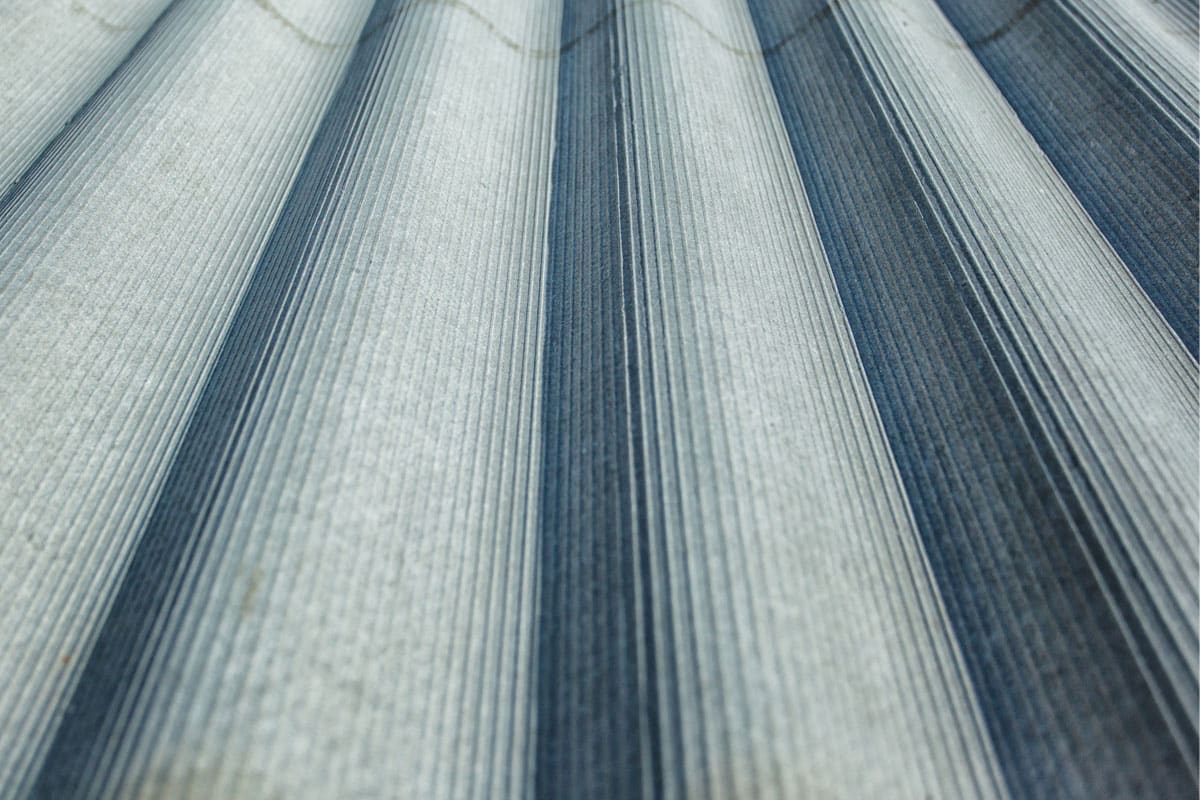 A close-up of a roof made out of asbestos.