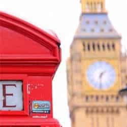 A photograph of a red letter box with Big Ben in the background.