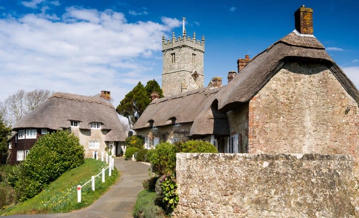 A photograph of the medieval All Saints' Church, located in Godshill on the Isle of Wight.