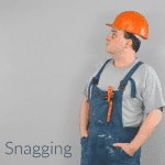 An image of a tradesman, worker wearing a hardhat. Text says, 'Snagging'.