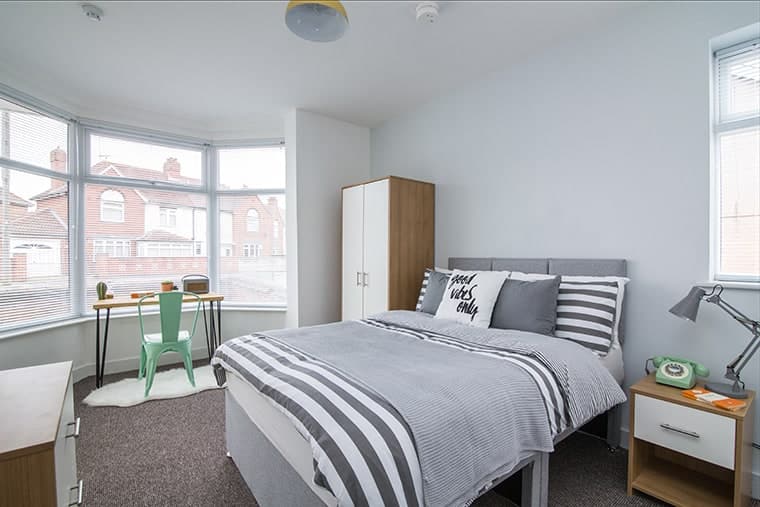 A photograph of a bedroom in an HMO