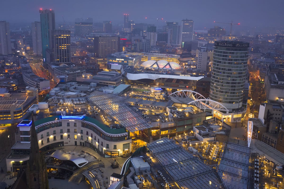 An aerial view of Birmingham city centre at dawn.