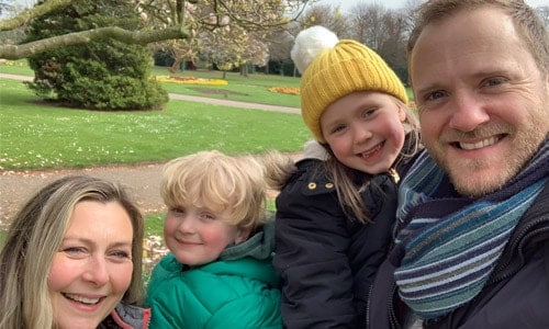 A photograph of Rob Jones, Director of Property Investments UK with his wife and children