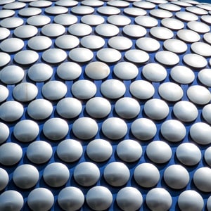 A photograph of the Selfridges building in Birmingham. Image focusses on the bubble texture of the outside of the building.