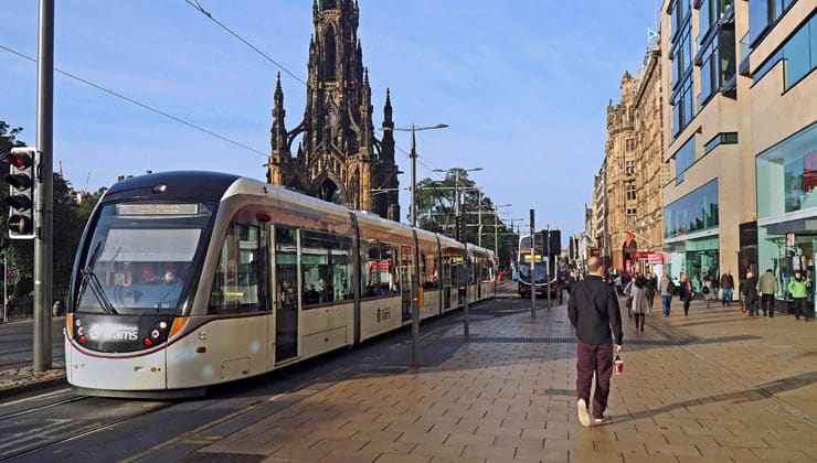 A photograph of a tram on Princes Street in Edinburgh