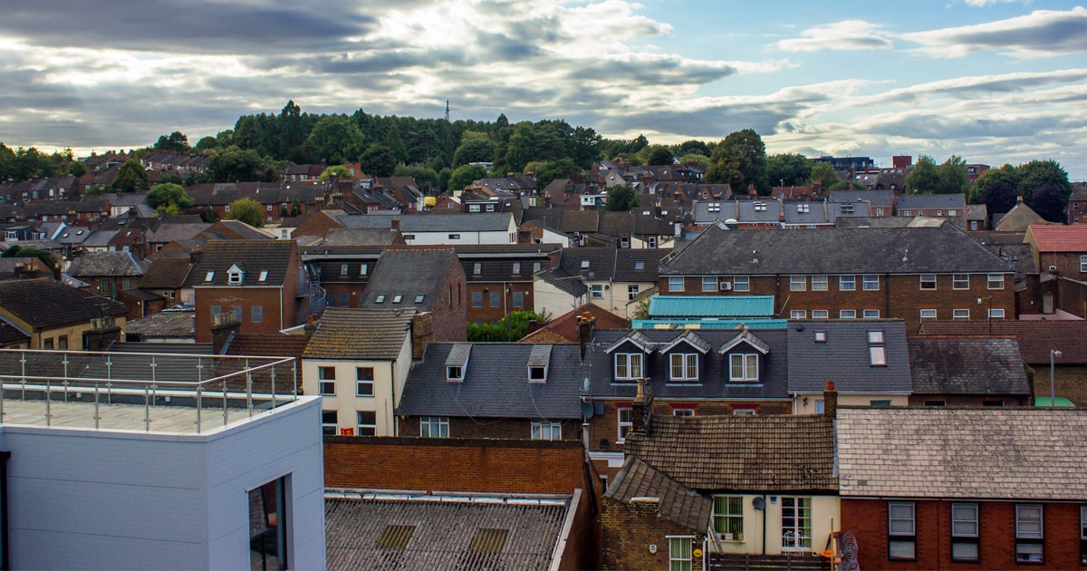 A slightly raised photograph of the rooftops of Luton, UK