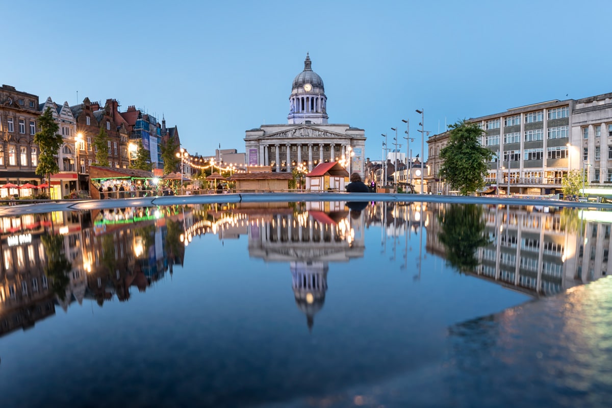 Council House also known as the city hall in the Old Market Square with a pool and fountain in the foreground, Nottingham.