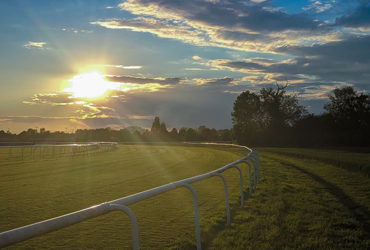 The sun setting over the track at Doncaster Racecourse.