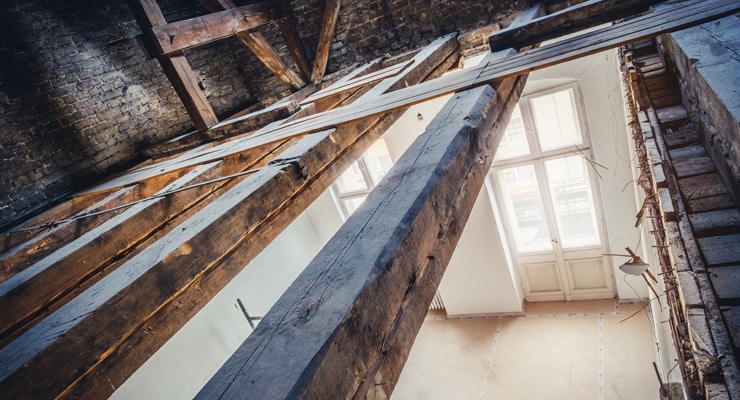 Roof beams suffering from dry rot.