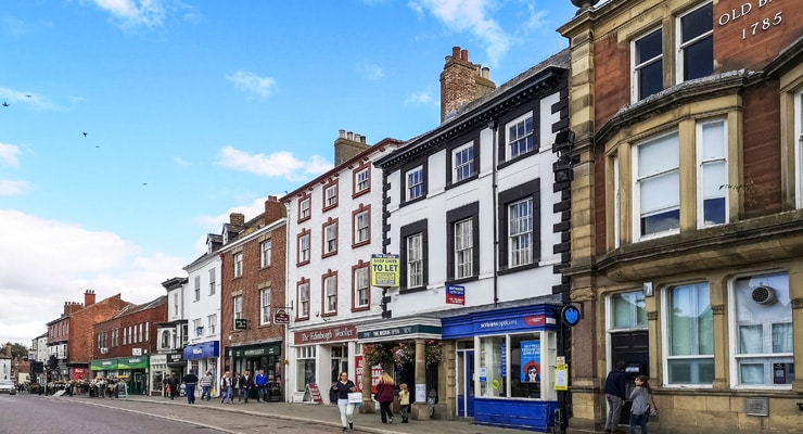 Commercial buildings fronting onto Market Square in Ripon, North Yorkshire