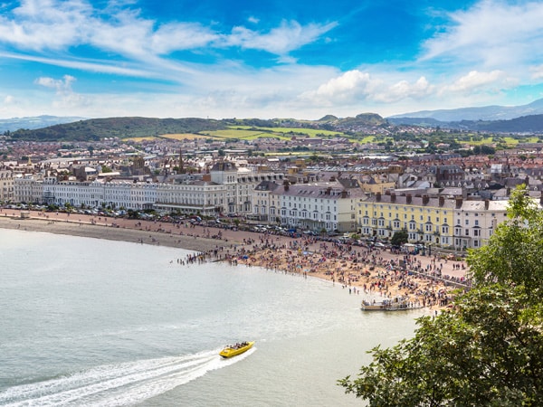 a raised panoramic photograph of the beach front at Llandudno