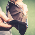 Graphic with a question mark on on a piece of paper. A logo for the 'Question of the Day' video series.