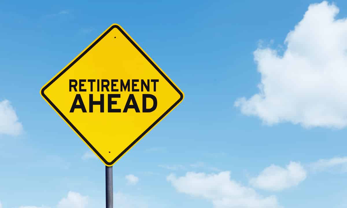 Picture of yellow sign with the text, retirement ahead, under blue sky