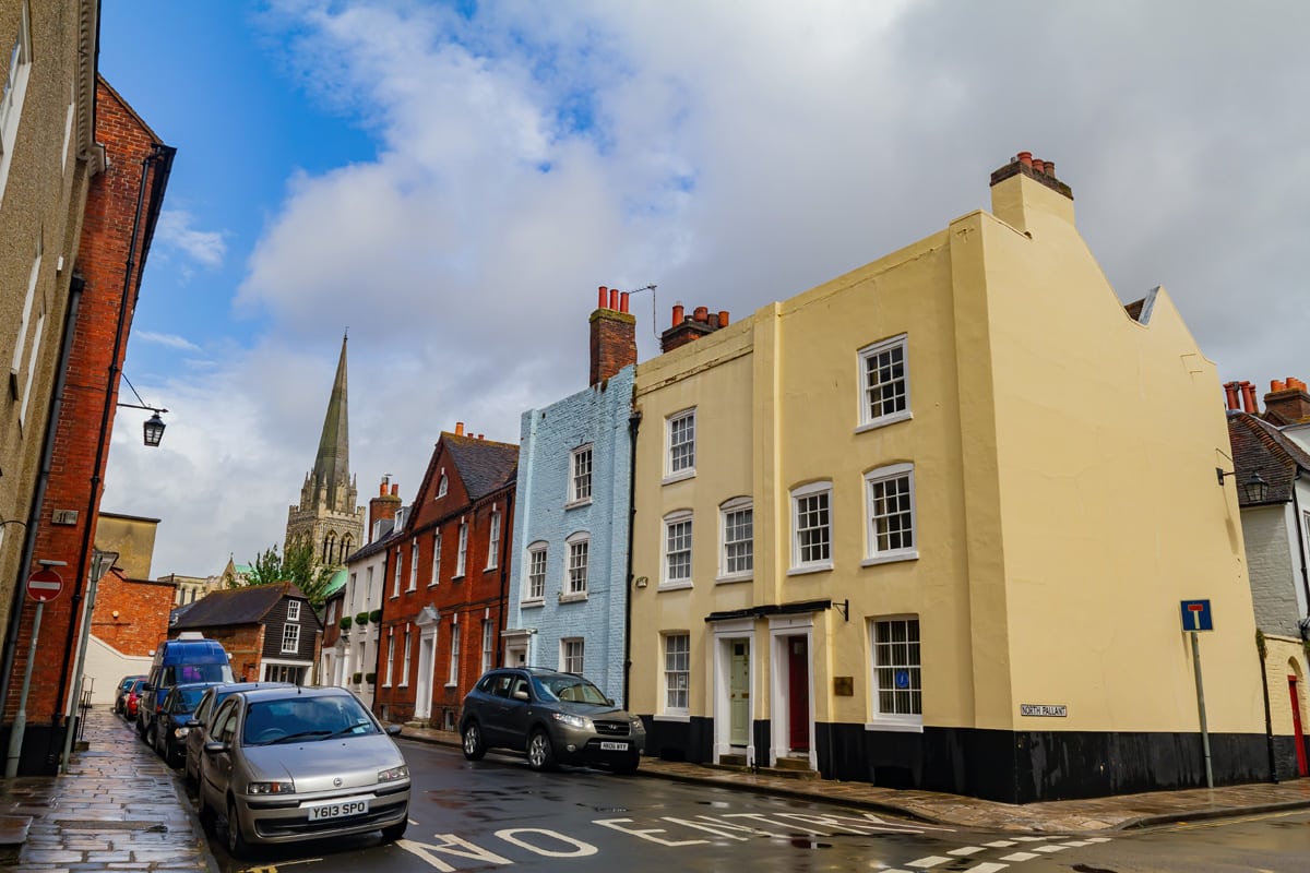 Colourful houses on a high street in Chichester, UK.