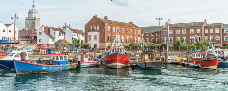 Old fishing boats docked in Portsmouth