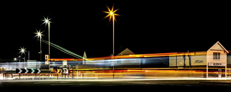 Light trails created by a long exposure at night. Photograph of the Magic Roundabout in Swindon