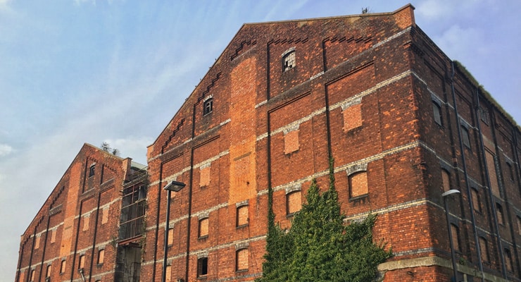 The side of an disused industrial building on Gloucester Quays