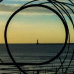 Sunrise behind the Roker Lighthouse in Sunderland.