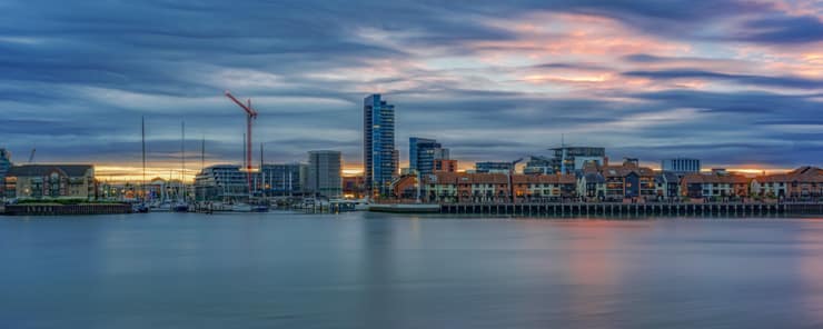 Sunset on the UK's south coast at Southampton with the city of Southampton in the background