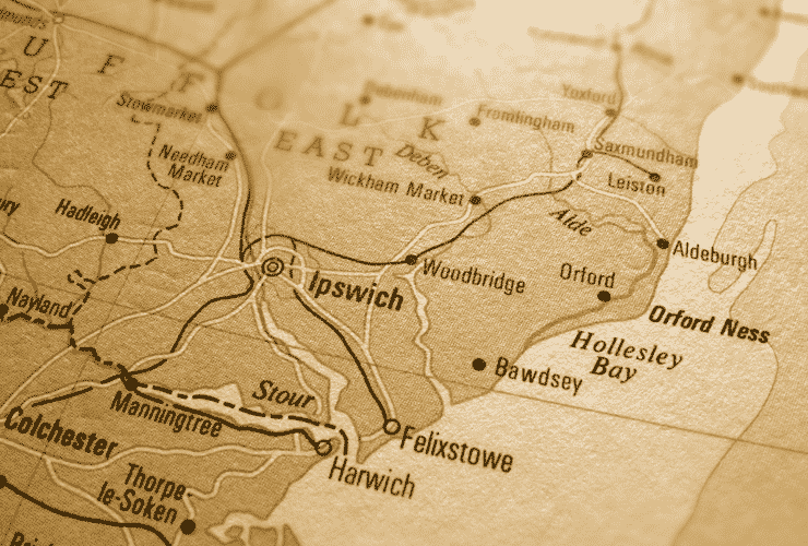 Ipswich in the middle of a sepia coloured partial map of Suffolk