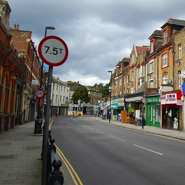 A deserted shopping street in North London.