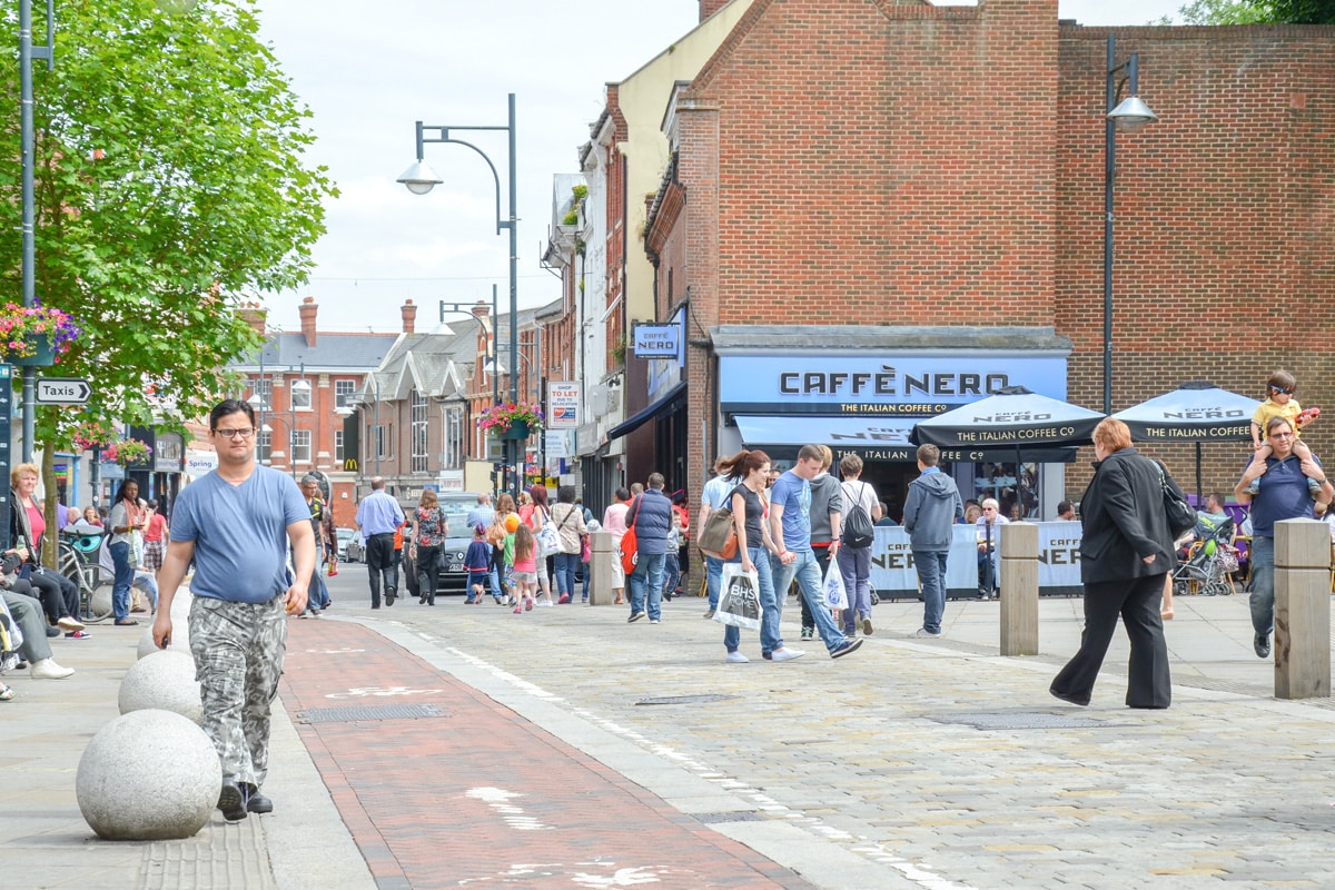 A busy shopping street in summer. Photograph of Watford High Street