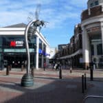 Watford town centre. A pedestrianised shopping area on a summer day.