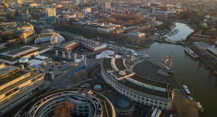 An aerial photograph of the city of Bristol and of buildings around the harbour area.