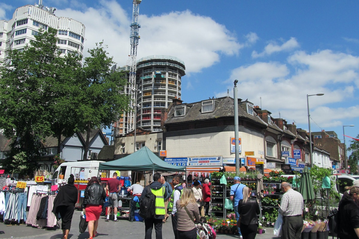 People shopping at the market, in Barking town centre, east London