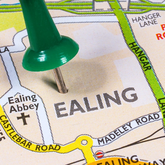 A pin stuck in a map of London in the district of Ealing.