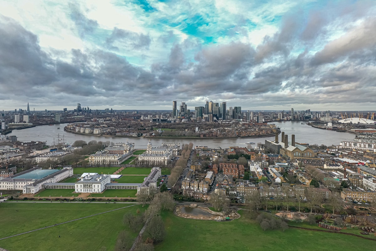 Aerial view of Greenwich with the Isle of Dogs, clearly visible in the background.