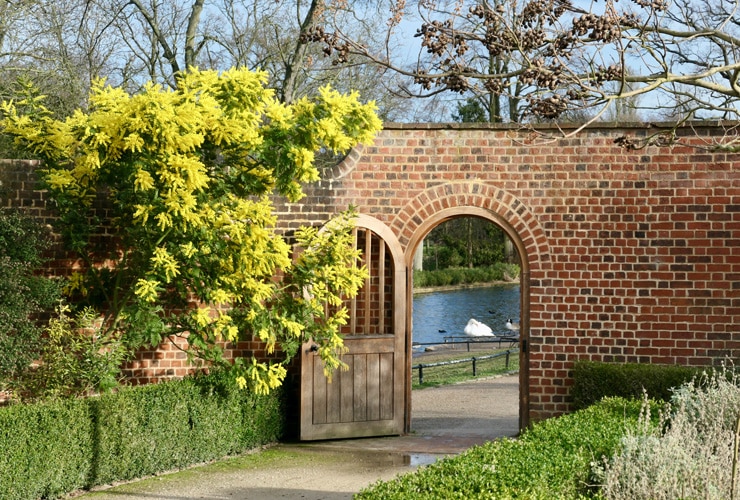 A wall with a door in a park. Valentines Park, Ilford, London.