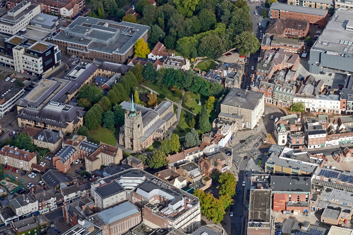 An aerial view of Chelmsford which includes Chelmsford Cathedral and Shire Hall.