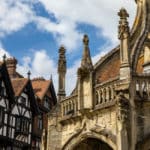 The Poultry Cross with a beautiful Tudor era timber-framed building in the background, in the city of Salisbury.