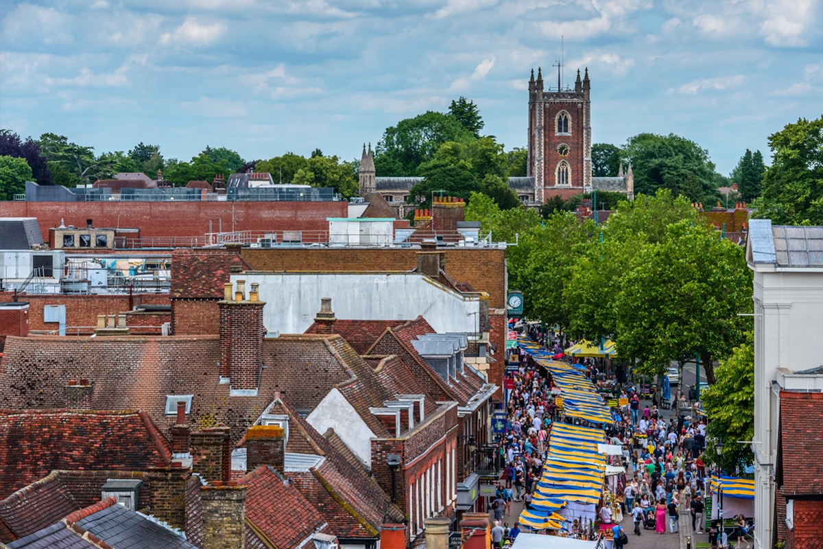 St Peter's Street and St Peter's Church seen from the Clock Tower on a market day. St. Albans, Hertfordshire, England.