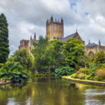 Wells Cathedral (Cathedral Church of Saint Andrew), Wells Abbey and park on sunny day, Somerset, England.