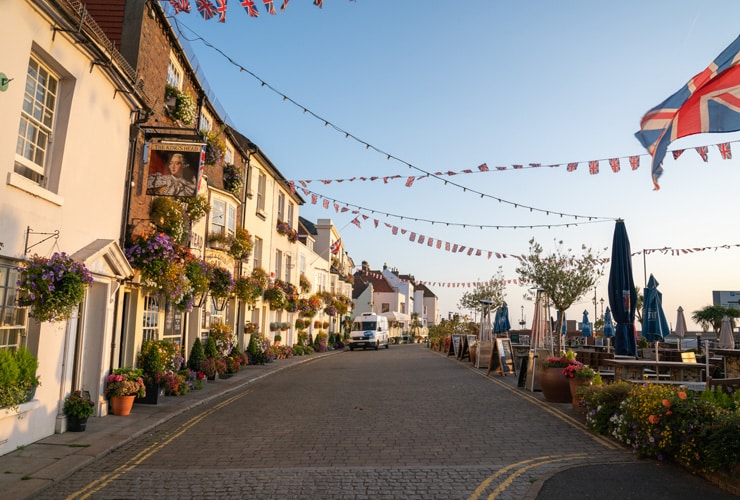 A beachfront in Deal with pubs, restaurants and bunting.