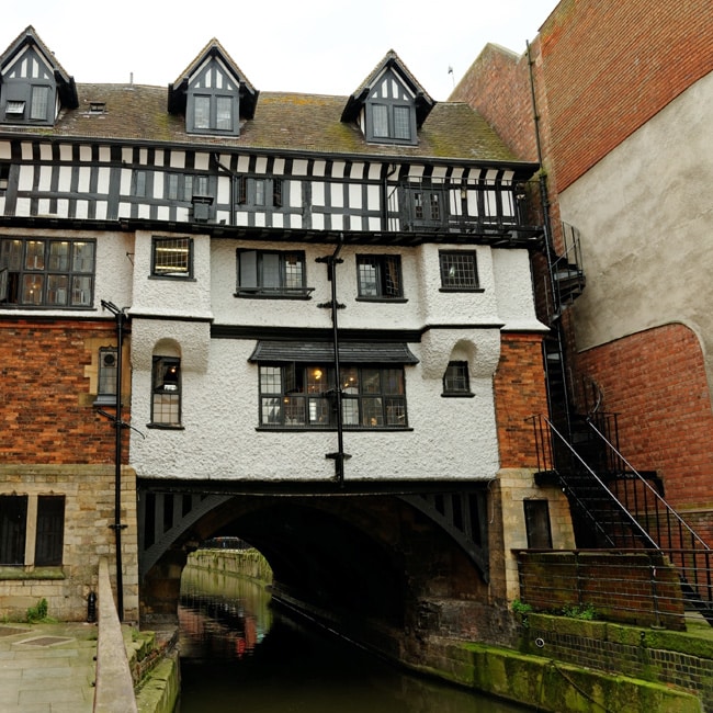 The High Bridge. A medieval timber framed building in Lincoln, England. It is the oldest bridge in the United Kingdom having been built in about 1160 AD.