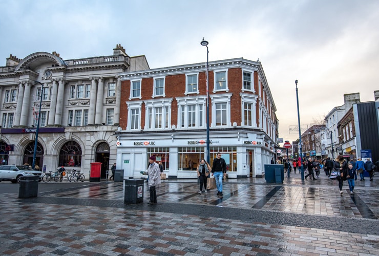 Shoppers wander through Maidstone town centre.