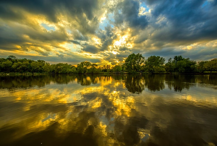 A sunset refelcted in a lake. A beautiful scene in Northlands Park, Basildon.