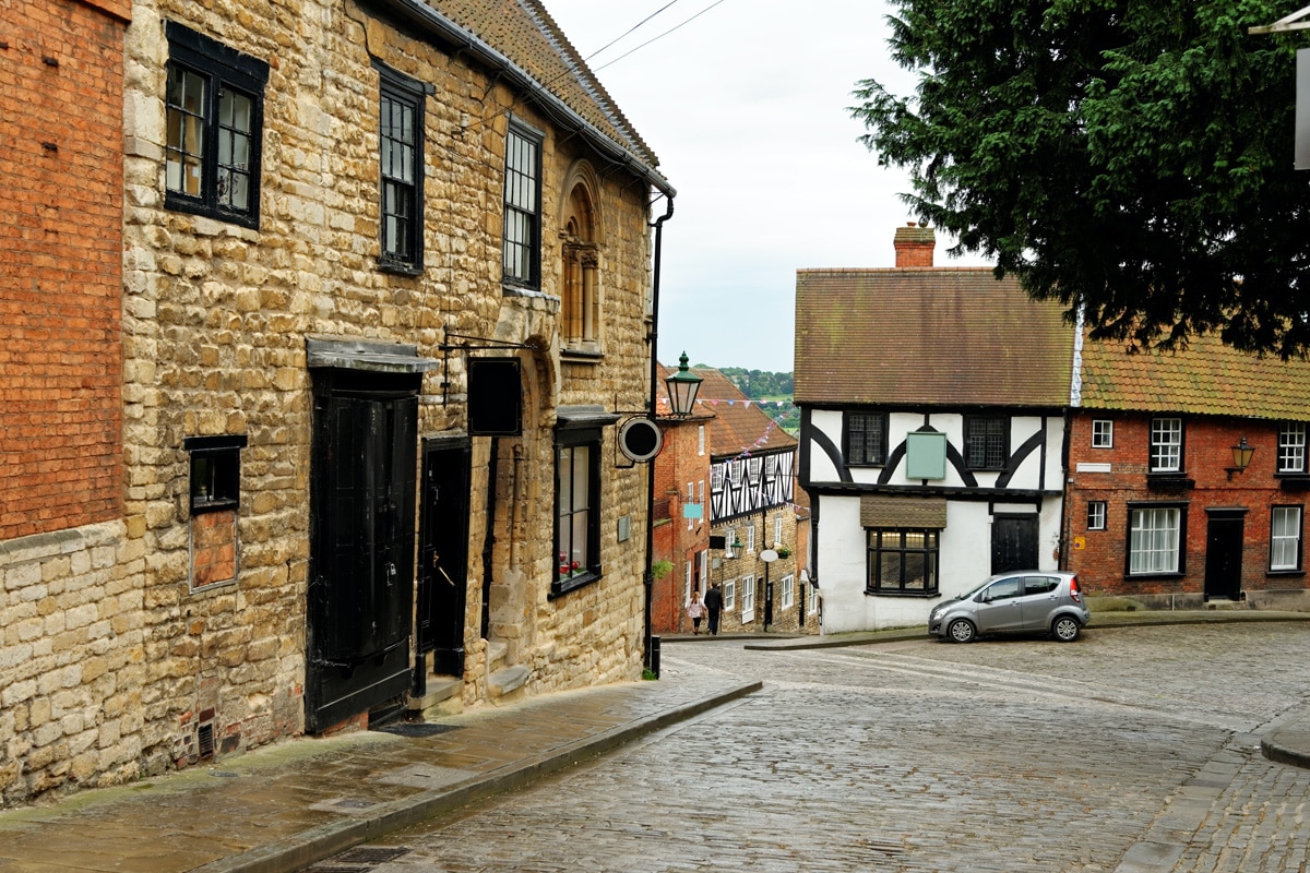 Steep Hill, a popular tourist street in the historic city of Lincoln, England.