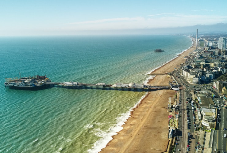 A aerial view of Brighton and Hove including the pier and seafront.