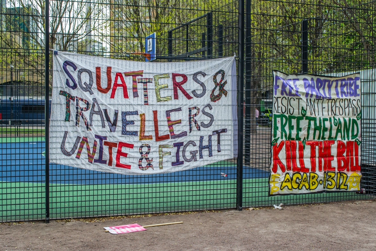 Pro-squatter and traveller rights banners at a KILL THE BILL protest in London.