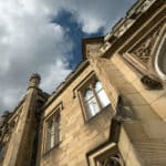 Looking up at a historic, listed building.