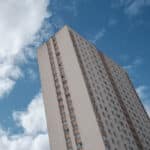 Looking up at an apartment block in Glasgow, UK.