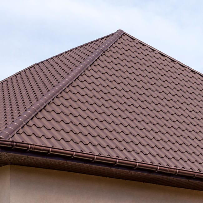 A close up shot of a hipped roof.