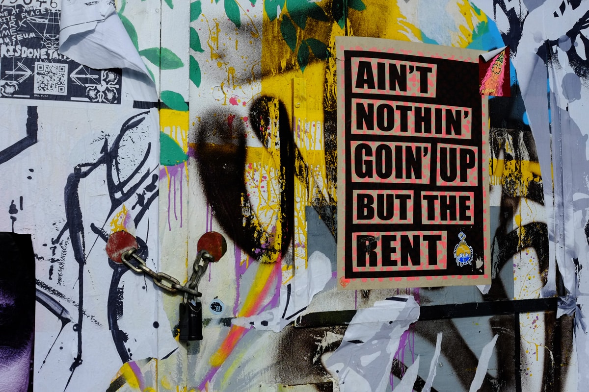 Poster in Hackney Wick protesting about rent rises in London due to regeneration and gentrification of the area.