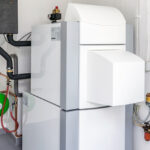 A residential oil boiler for a heating system.